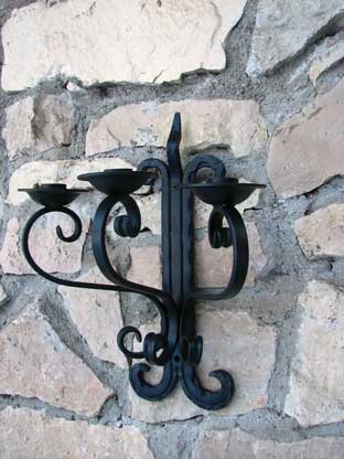 Forged metal candlesticks